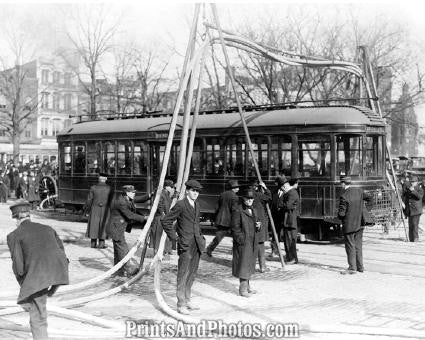 FIREMAN Hoses Over Streetcar  1334