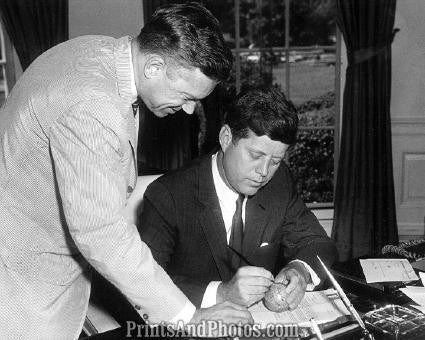 John F Kennedy Signing Baseball 2819